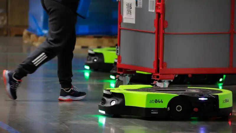 AI News from ET - Amazon unveils upgraded autonomous robot Proteus, expands Amazon Now in UK 